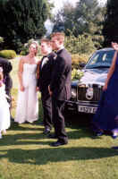 Gathered around the car.